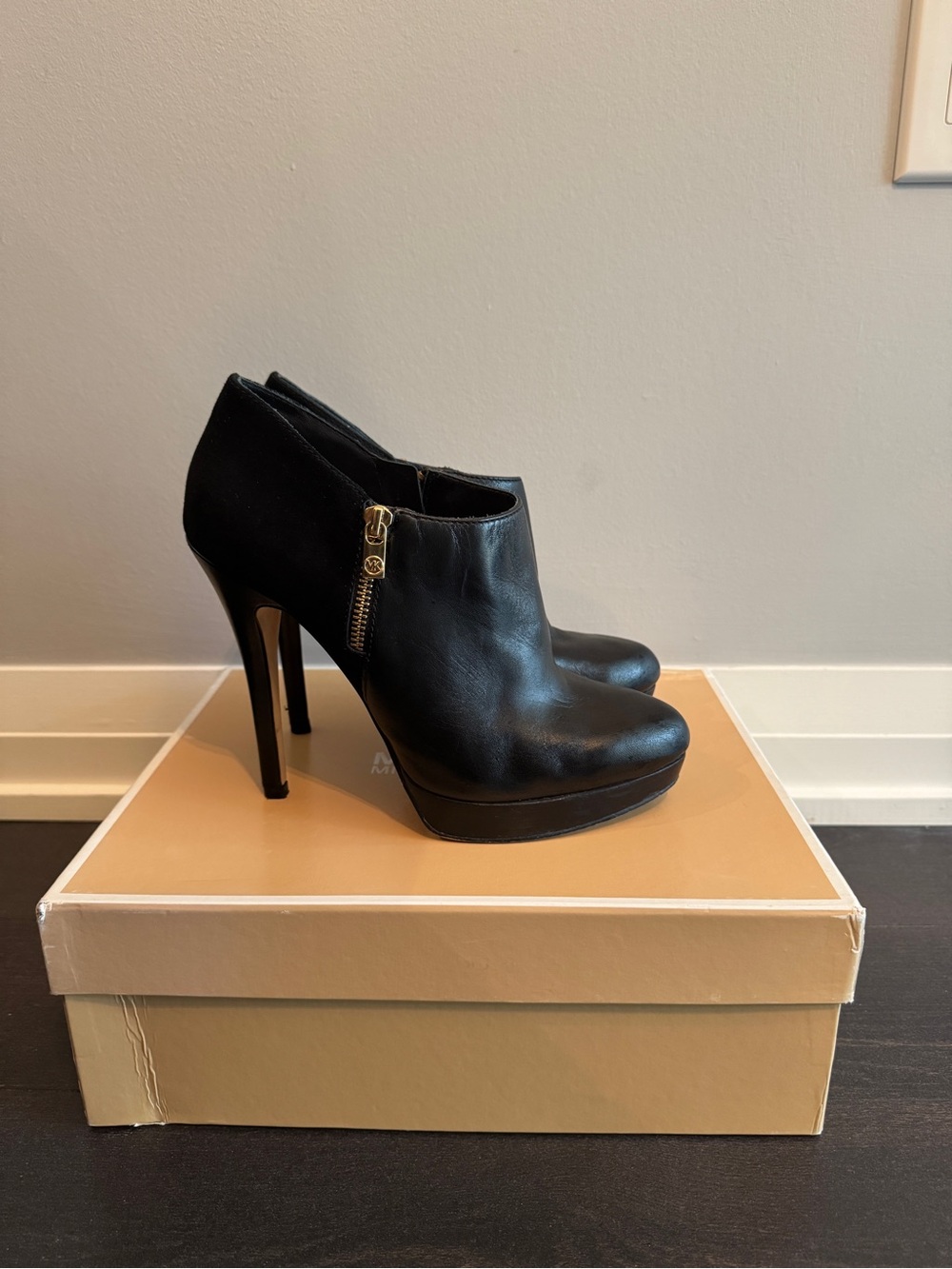 MICHAEL Michael Kors Black Leather Heeled Ankle Booties with Gold Buckle